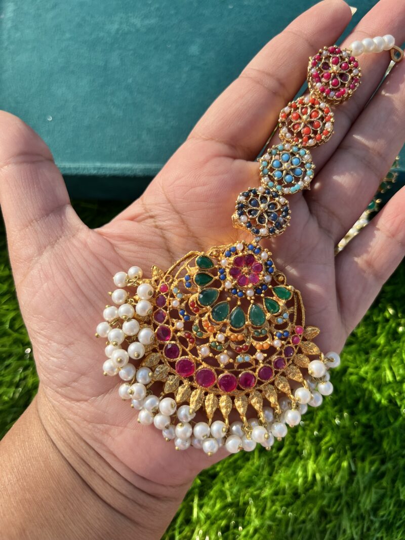 Nauraten earring tikka