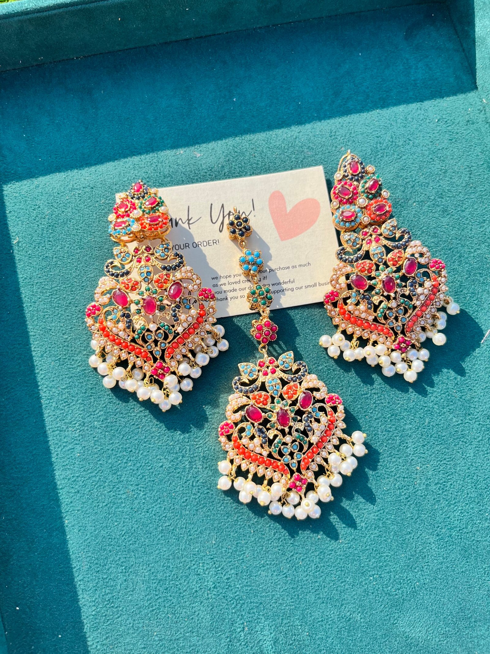 Nauraten earring tikka